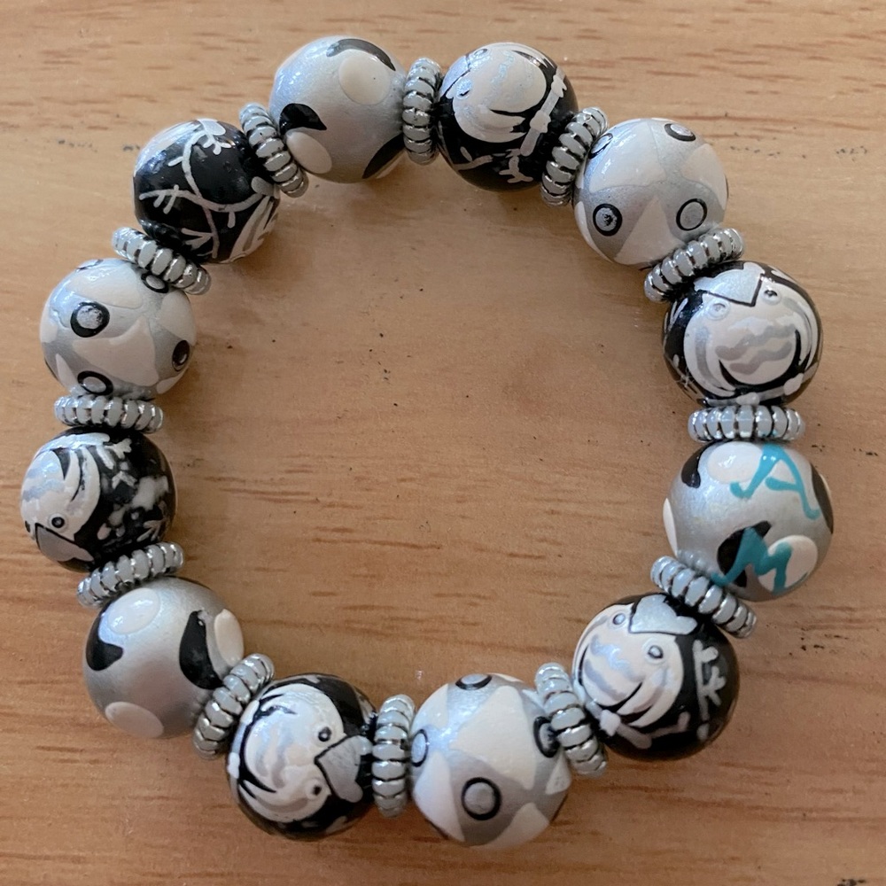 Angela Moore hand painted beads bracelet. Gray/black/white with owls.